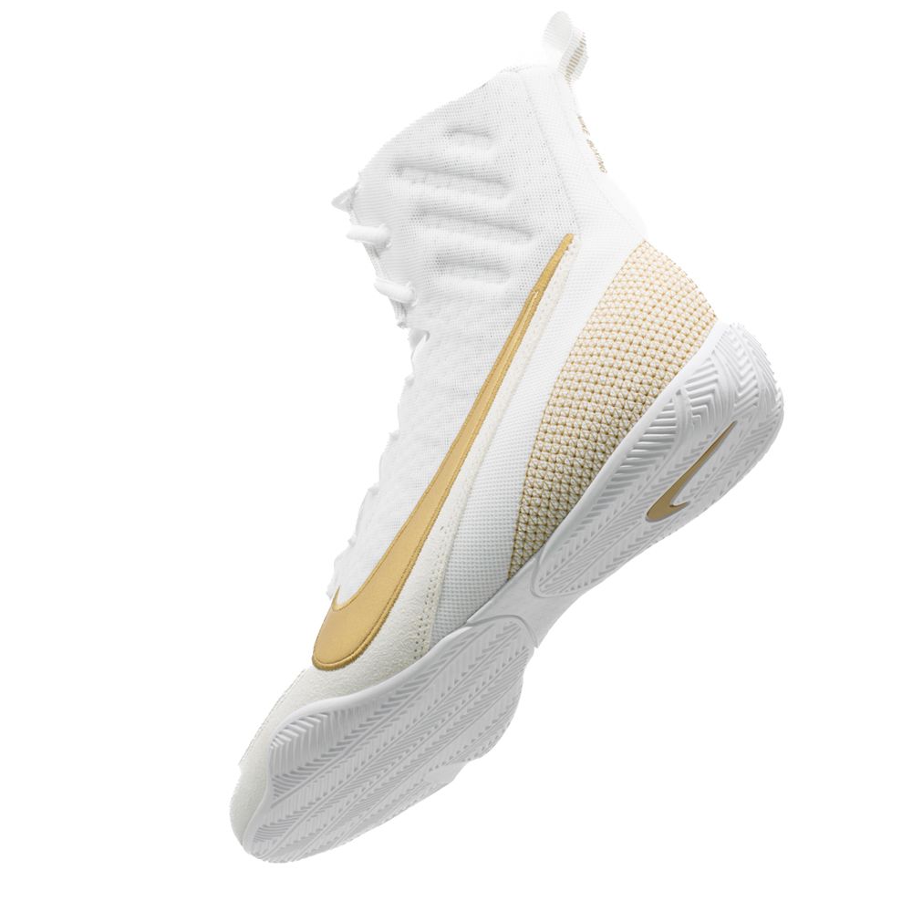 nike white and gold boots